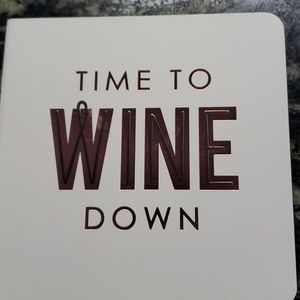 Wine coaster book with 6 pop out coasters. NEE